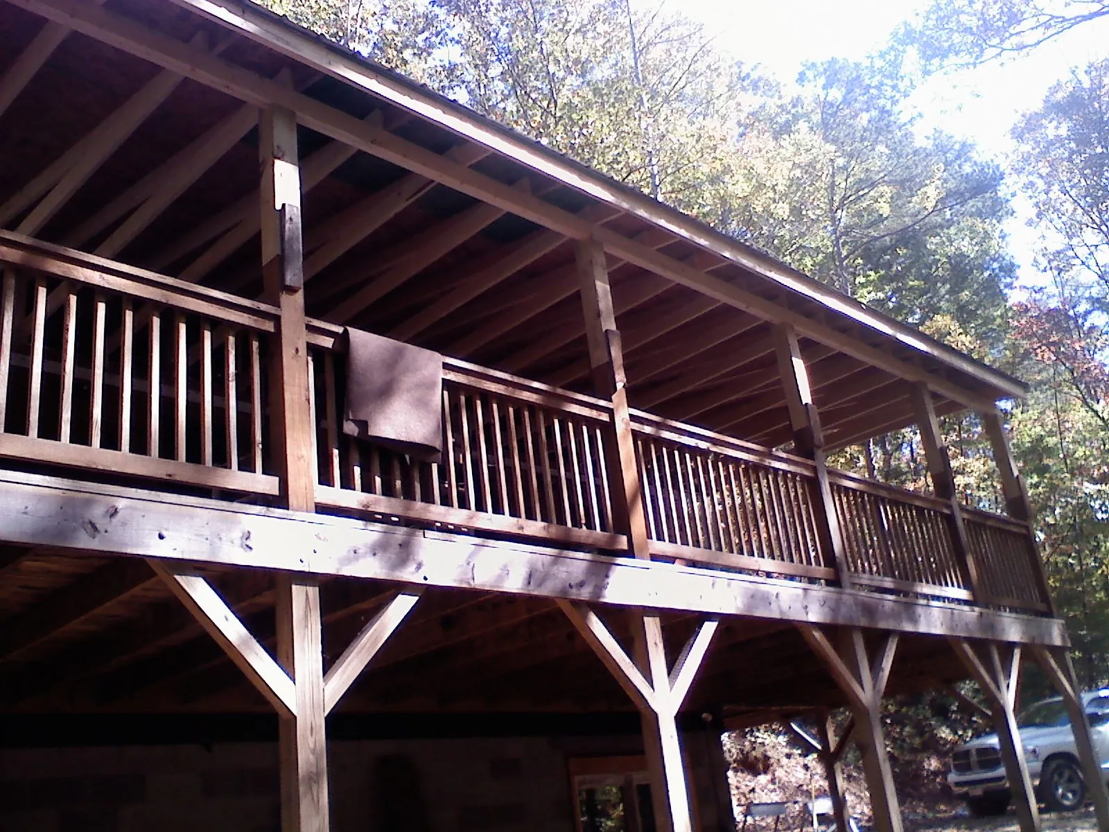 Timber framing under a new elevated porch and deck — Roof Leak Repair in Waldport by Roofing Brothers